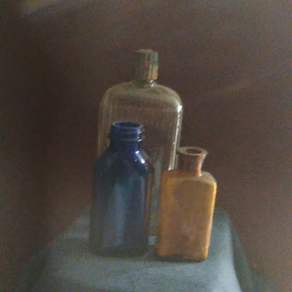 3 glass bottles
